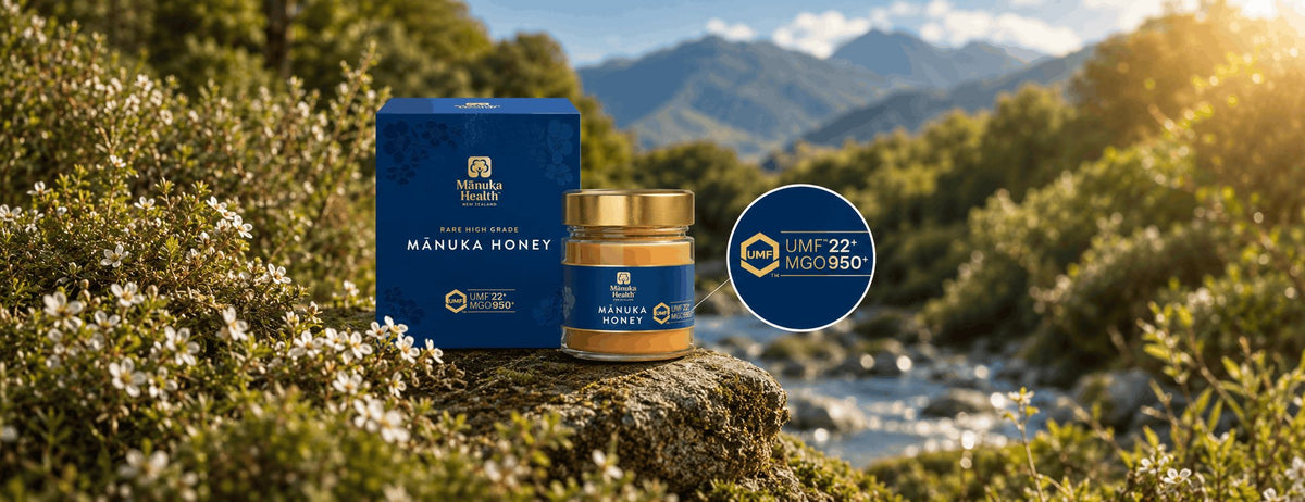 Manuka Health UMF 22+ MGO 950+ Manuka honey jar and box in a New Zealand landscape, with a close-up of the UMF grade mark